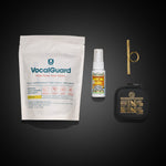 Perform & Power Starter Kit — flat-lay of kit contents on dark ground: VocalGuard powder pouch, Vocal Eze throat spray, and OOVO Sing Ring with case.