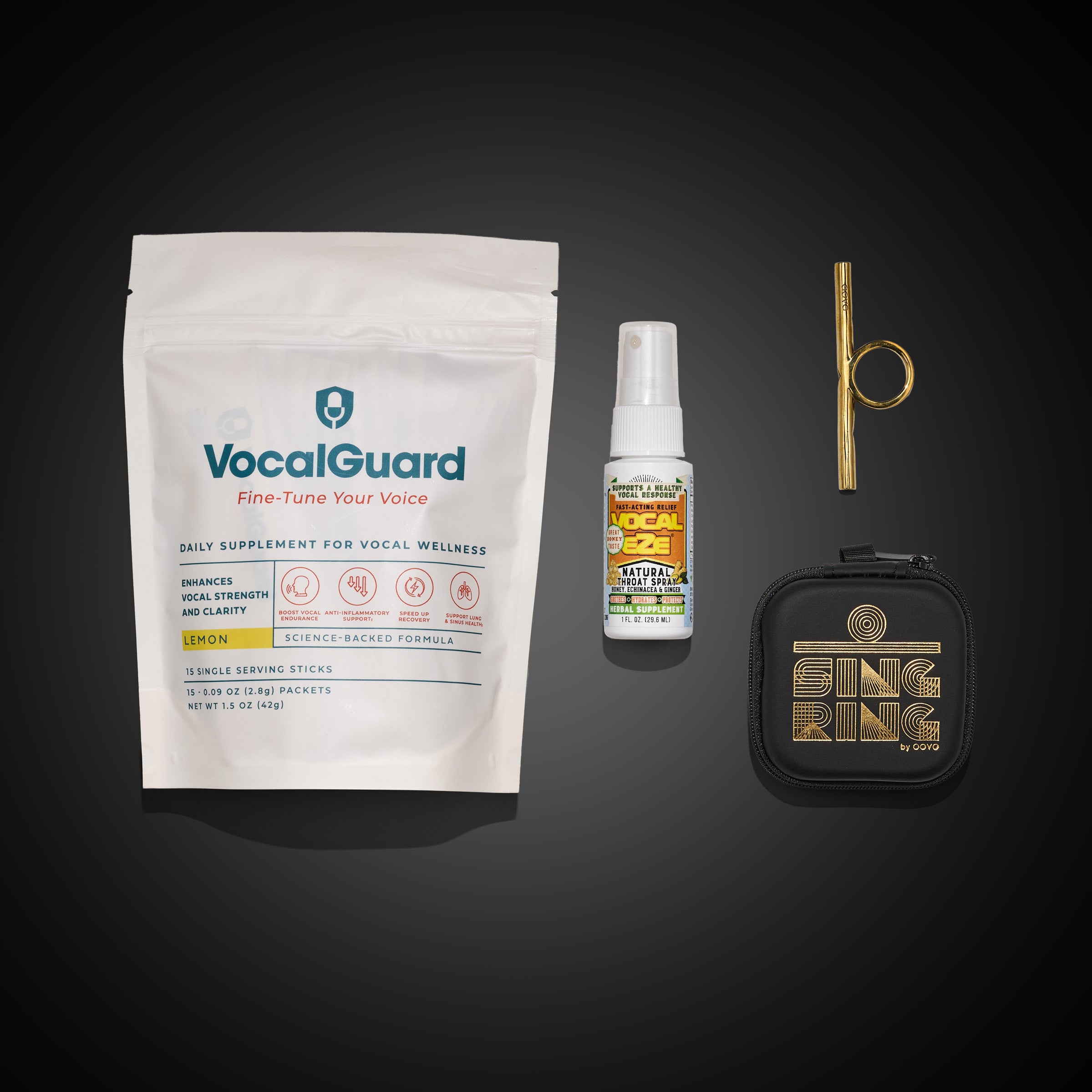 Perform & Power Starter Kit — flat-lay of kit contents on dark ground: VocalGuard powder pouch, Vocal Eze throat spray, and OOVO Sing Ring with case.