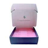 VocalMist Hydration Formula — opened box showing pink saline vials.