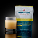 VocalGuard Lemon powder pouch (30-day supply) with mixed glass, studio shot