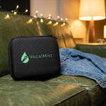 VocalMist carrying case on a green-room sofa before a show.