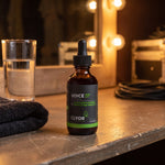 Clyor's Clear Voice 37 Tonic on a theater dressing-room counter under warm mirror lights.